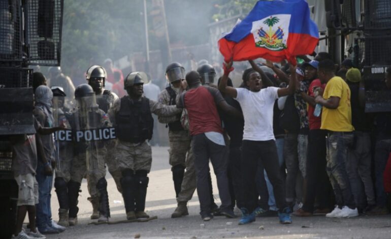 PROTESTS OVER OFFICER KILLINGS LEAD HAITIAN POLICE TO BLOCK STREETS