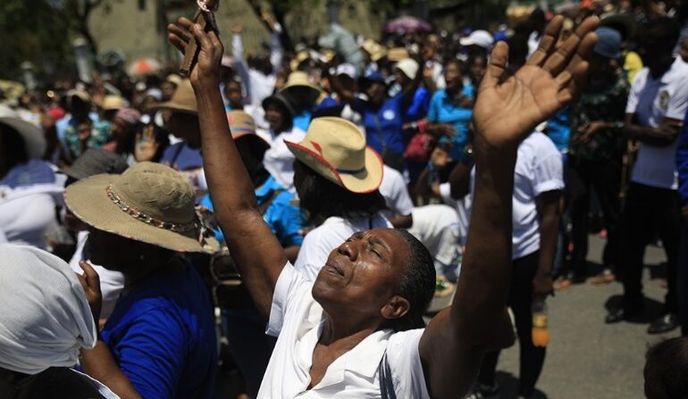 POLICE KILLED IN AMBUSH BY HAITIAN GANGSTERS