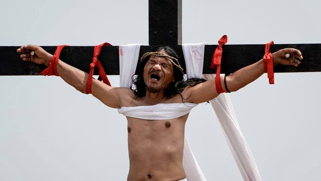 A FILIPINO VILLAGER NAILED TO CROSS FOR 35TH TIME ON GOOD FRIDAY